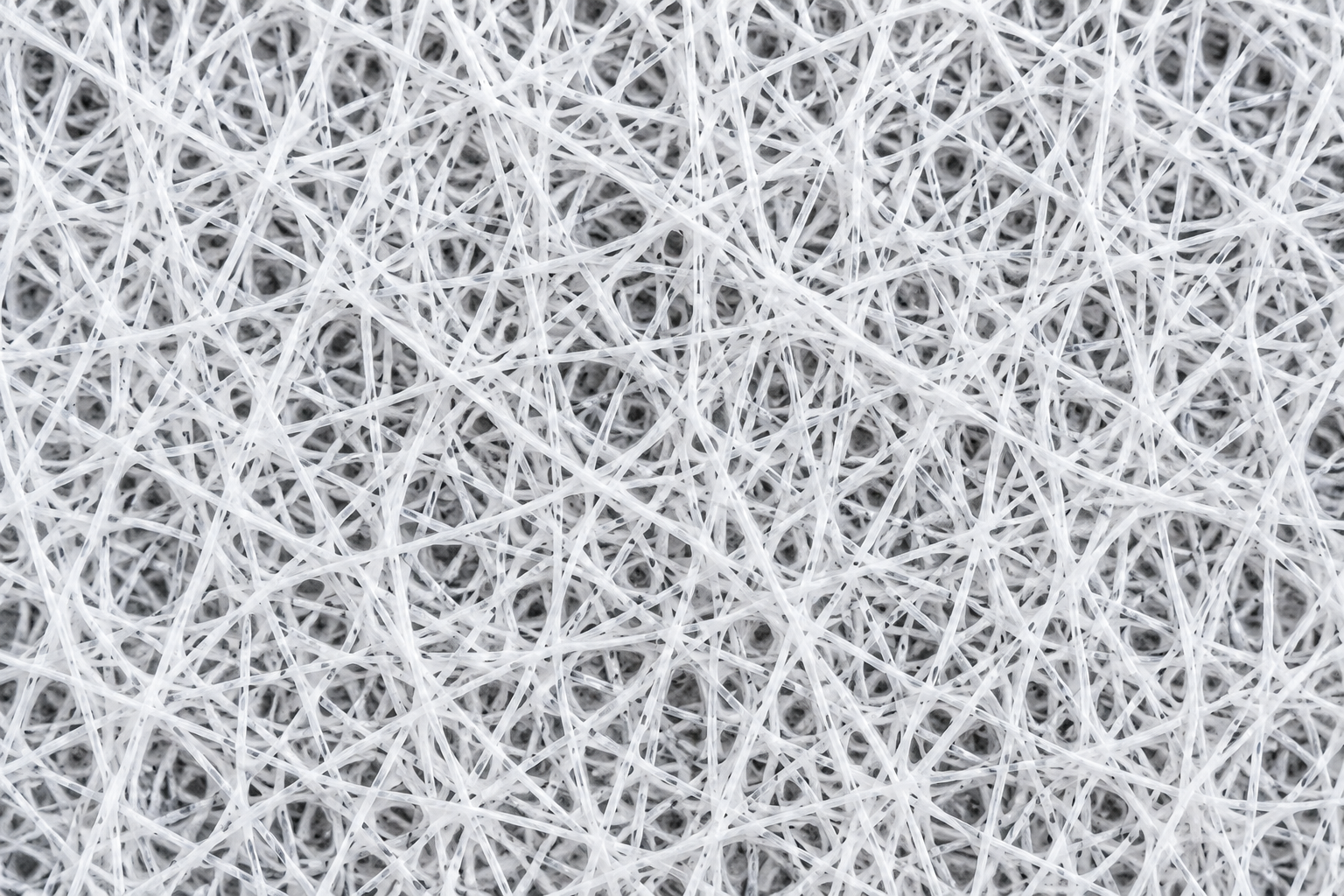 Close-up of the white polypropylene sediment pre-filter cartridge.